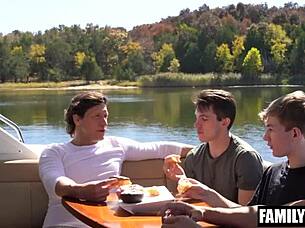 Muscular stepfathers fuck young stepsons on a boat trip