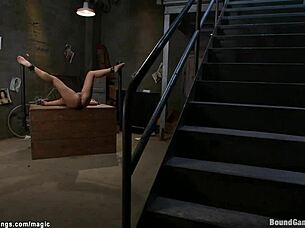 Asian beauty gets tied up for double penetration with big cocks