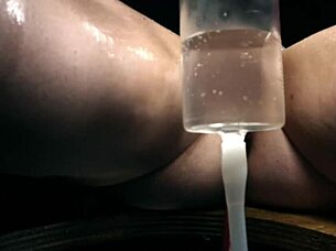 Lexi’s BDSM enema punishment on the bondage bench
