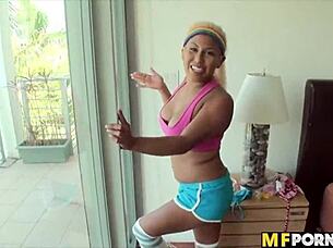 Big-boobed blonde Latina in sports-themed porn film.