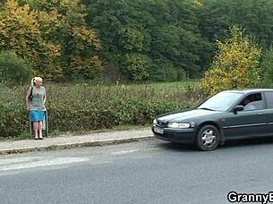 Hitchhiking old woman and young man in hot scene