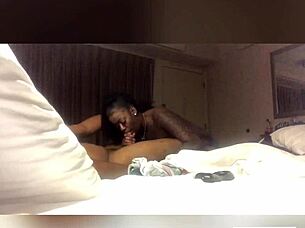 A black beauty gets a mouthful of cum from a BBC