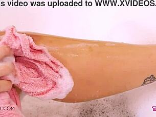 Brunette beauty gets a sensual massage with her mother in law’s help
