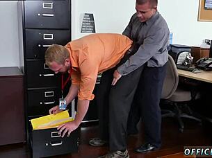 Young and old gay men engage in sex wrestling on their first day at work