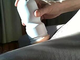 Gay rubber daddy Paja's wild squirt and cum scene with Fleshlight