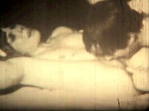 A hot milf and a hairy mature get steamy in this retro porn video