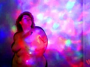 A plump redhead worship dance with oil and cloth stripping