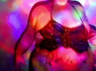 A plump redhead worship dance with oil and cloth stripping