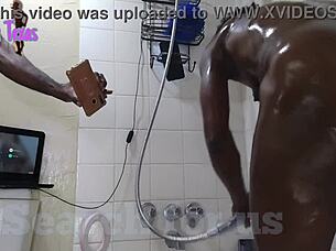 Black granny gets a good shower and fucking session