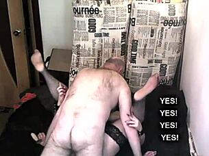 A BDSM scene with a mature woman who is a submissive slave