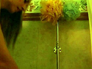 A sexy blonde woman takes a shower on Halloween night