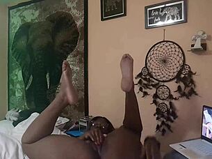 Naejae masturbates while watching lesbian porn videos