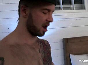 Muscular gay pornstar jerks off straight stripper's big cock