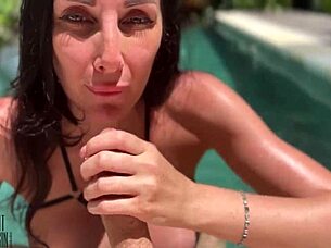A woman with an amazing set of large breasts has a hot affair by the pool