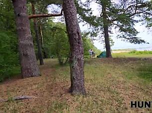 Skinny redhead gets fucked in nature by a friend