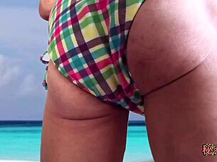 Beautiful amateur shows off her assets in a bikini
