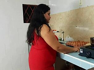 A black girl with an amazing set of large natural breasts has a rough and passionate experience with a young and inexperienced man in the kitchen