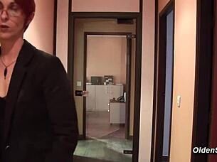 A mature woman in a suit is being fucked by a French guy