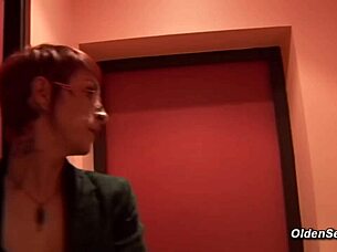 A mature woman in a suit is being fucked by a French guy