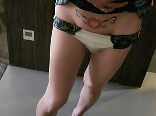 She likes to flirt with herself while getting ready in the mirror