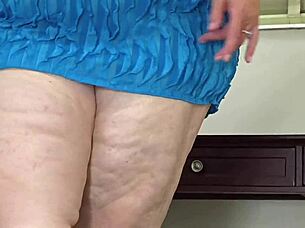 Fat ass busty MILF in mini dress, spreading pussy