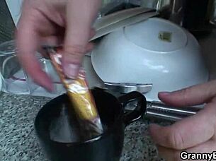 Young guy enjoys granny’s big tits and takes her from behind