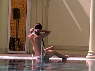 Petite teen Irina Russaka with small tits enjoys swimming underwater