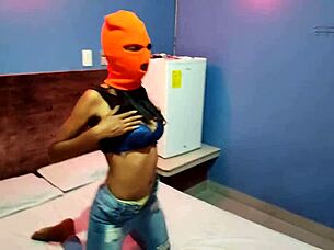 I love how my brunette girlfriend tells me she wants to celebrate Halloween in a hotel bed, puts on a mask, shakes her body and hips so sexy, and finally gets naked for me