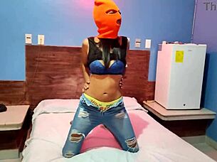 I love how my brunette girlfriend tells me she wants to celebrate Halloween in a hotel bed, puts on a mask, shakes her body and hips so sexy, and finally gets naked for me