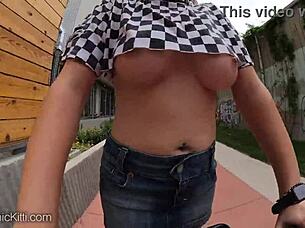 Crowd-surfing blonde flashes breasts in public but unfortunately for her a perverted twat with a camera decided to record her