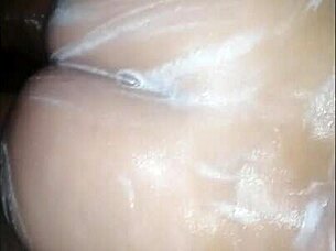 Handjob and anal play with a brunette stunning lady