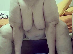 A mature woman has a bout of masturbation