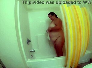 Amateur bbw milf enjoys early morning hotel shower session