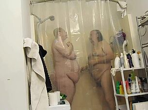This video shows a gorgeous couple together naked showering