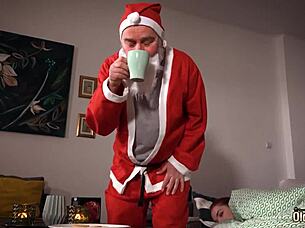 Mature Santa bangs young girl with a facial