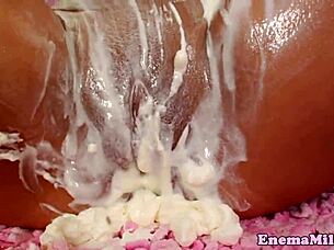 Brunette babe loves assfucking and enema in hardcore video