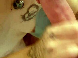 Mona has naked tattooed skin and small tits stunning in this POV blowjob scene
