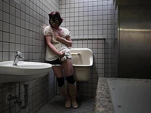 Porn star Shemale Ayumi fucks in public toilet