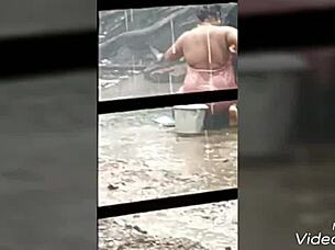 indian village bhabi bathing in the open air