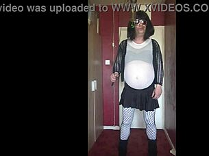 Real amateur homemade video of a bisexual crossdresser looking to fill up with urine