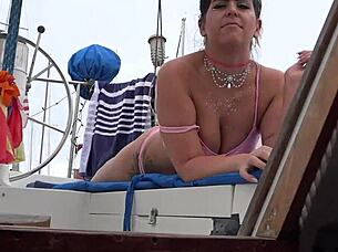 Two asian bikinis were picked up and switched the load on her boobs