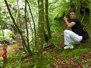 The woods seduces a brunette, man being aroused by outdoor anal penetration
