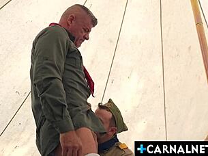 Scout Logan Cross enjoys a solo session with his scoutmaster, the very cuddly LeGrand Wolf in his tent