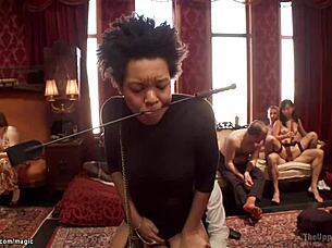 Blond on a table gets tied up by BDSM group for rough sex