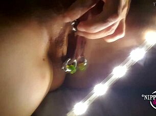 A homemade video of Nipple loving MILF gets her pussy lips pierced