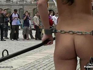 The European woman rides naked in the chariot in the public