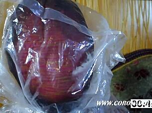 A kinky rubber fuck doll consisting of latex and bondage layered