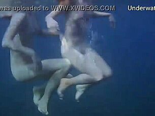 Bathing in the sea: Sexy teen ginger takes a swim