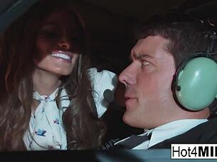 Busty flight attendant has sex in the cockpit