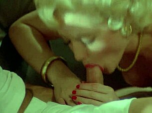 In a classic California porn film from 1983, John Leslie and Hillary Summers